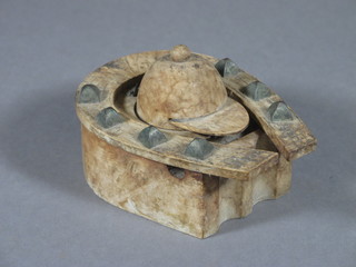A Victorian carved wooden inkwell in the form of a horseshoe with jockey's cap, complete with china liner 5"