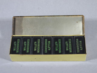 A set of Wills plastic Woodbine dominoes contained in a metal box