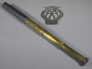 A brass 2 drawer pocket telescope marked Cub 18x and an AA  beehive badge