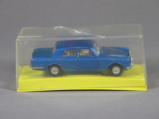 A Dinky Toy marble of a Rolls Royce Silver Shadow