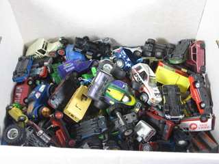 A box containing a collection of toy cars