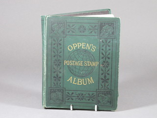 A collection of World stamps contained in a green Oppen's  album