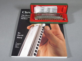 A harmonica Chromonica 270 boxed and 1 volume David Harp  "How to Play Your Chromonica Harmonica"