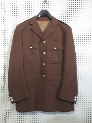 A Queens Regiment Officer's Service dress jacket and trousers by Alkit