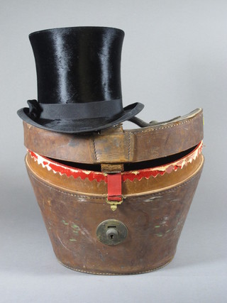 A gentleman's Continental black top hat complete collars and leather carrying case