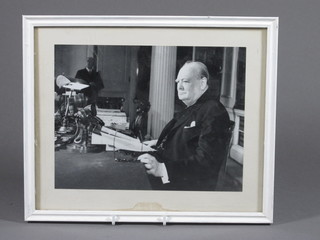 A black and white photograph of Winston Churchill about to broadcast 6 1/2" x 8 1/2"
