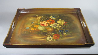 A rectangular lacquered twin handled tea tray decorated flowers  25"