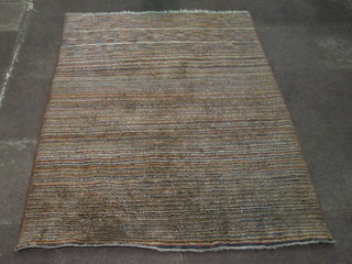 A modern multi-coloured rug 72" x 52 1/2"