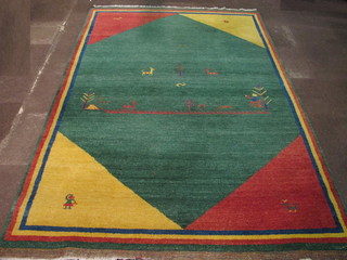 A contemporary green, yellow and orange tribal style rug with  diamonds to the centre and decorated birds and animals 117" x  79"