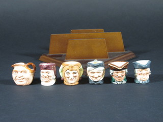 A set of 6 tiny Royal Doulton limited edition character jugs -  Parson Brown, Dick Turpin, Granny, Jester, Simon the Cellarer  and John Barleycorn, the base marked D6952 number 821 1 1/2"