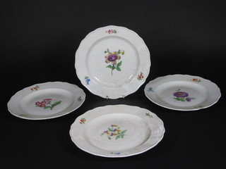 4 Meissen porcelain plates with floral decoration, the reverses incised 32 10" with cancellation mark