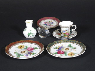 2 circular Continental porcelain plates, a cabinet cup and saucer, a miniature Coalport vase and a miniature glass figure of a bird