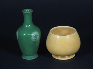 A Moorcroft green glazed club shaped vase, the base with  signature mark and RD452777 5", chip to base, together with a  yellow glazed "Moorcroft" bowl 3"