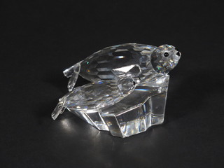 A Swarovski crystal figure of 2 sea lions 4"