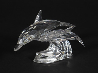 A Swarovski crystal limited edition figure of dolphins 4 1/2"  ILLUSTRATED