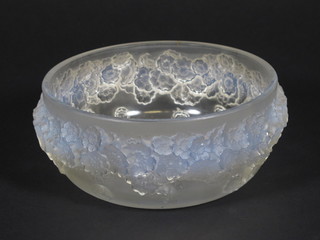 A Lalique circular bowl with floral decoration - Primeveres,  circa 1927 base marked R Lalique, 6"   ILLUSTRATED