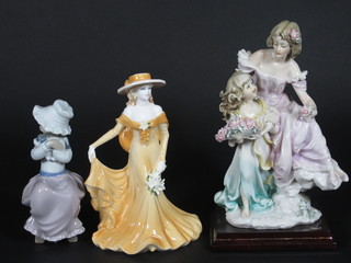 A Nao figure of a seated girl 7", a Coalport figure - Dear June  and an Italian pottery figure group of mother and child