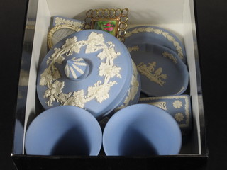 A Wedgwood blue Jasperware jar and cover 4 1/2" and a do.  vase 4", do. jar and cover 3 1/2" and 4 pin trays and 2 metal  easel photograph frames