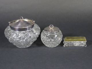 A rectangular cut glass dressing table jar with plated mount 4", a circular glass preserve jar with plated mounts and a do. biscuit  barrel