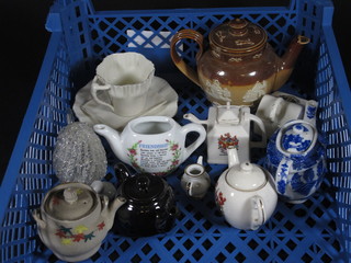 A Doulton Lambeth Harvestware teapot and a small collection of other teapots, crested china, curios etc