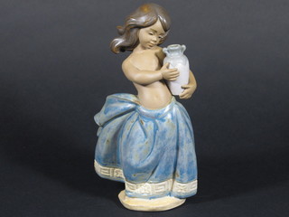 A matt Lladro figure of a standing girl with urn, base marked  2231 7"