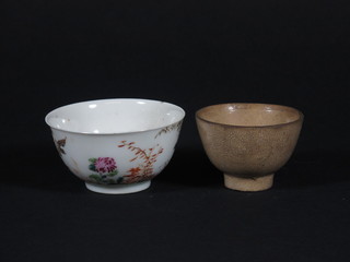 An Oriental crackle glazed tea bowl the base marked Digwall Collection no.358 1 1/2" and an Oriental teabowl 2"