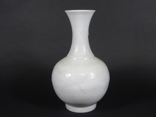 An Oriental blanc de chine club shaped porcelain vase the base with seal mark 13 1/2"