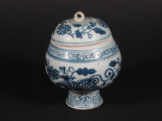 An Eastern blue and white jar and cover raised on a circular spreading foot 5"