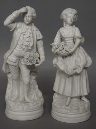 A pair of 19th Century Parian figures of a standing lady and gentleman 13"