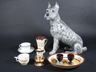 A pottery figure of a seated dog 18", a moustache cup and saucer, a Royal Doulton boat shaped dish 11", 2 etched rub glass  squat goblets - 1 cracked, etc