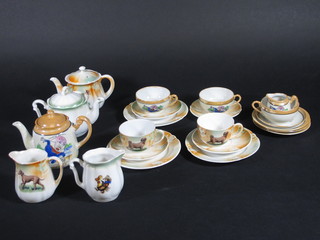 A childs 11 piece tea set decorated dogs comprising teapot, cream jug, 3 cups and 3 saucers, 3 plates and a part Humpty  Dumpty dolls house tea set and 1 other decorated a seated child