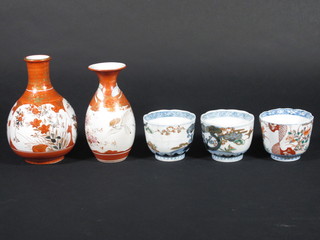 A Kutana club shaped vase 6 1/2", 1 other 6" together with 3 Japanese Imari bowls 8 1/2"