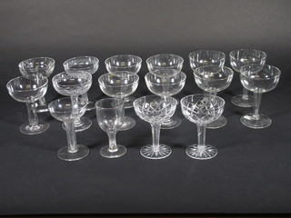 15 various champagne saucers with hollow stems and a hollow stemmed wine glass