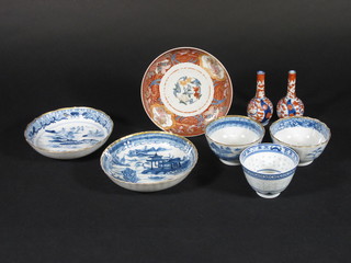 A pair of Japanese Imari club shaped vases 3 1/2", 2 Oriental  blue and white saucer, an Imari saucer and 3 Oriental tea bowls