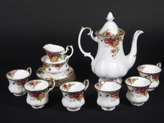 A 15 piece Royal Albert Old Country Rose pattern coffee service comprising coffee pot, sugar bowl, cream jug, 6 coffee cups and  6 saucers - 1 cup cracked,