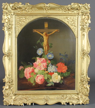 19th Century arch shaped oil on canvas, still life, "Crucifix with Flowers" 21" x 17", contained in a decorative gilt frame   ILLUSTRATED