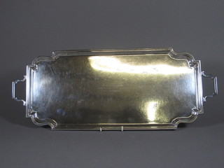 A rectangular silver plated twin handled bottle tray 18"