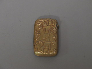 An embossed gilt metal vesta case decorated a horseman