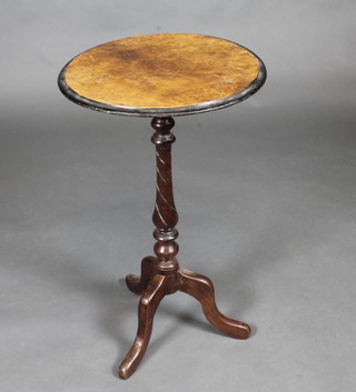 A Victorian walnut wine table, raised on a turned column and tripod base 17"