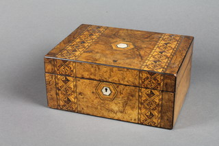 A Victorian walnut trinket box with hinged lid, the interior fitted a musical box movement 12"