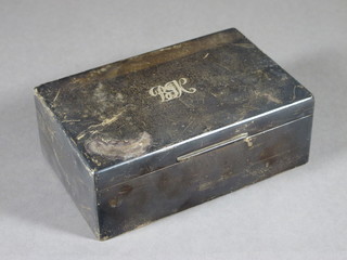 A rectangular silver cigarette box with solid hinged lid, London  1938 5 1/2"  ILLUSTRATED