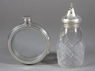 A cut glass sugar sifter with plated mount together with a glass and pewter mounted hip flask