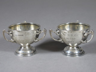 A pair of miniature silver 3 handled trophy cups, Birmingham  1919, 2 ozs