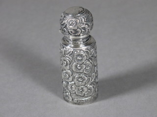 A Victorian embossed silver perfume bottle complete with glass stopper, Birmingham 1898 2 1/2"