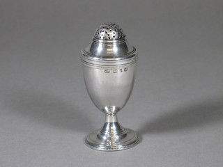 A Georgian style silver pepperette raised on a spreading foot, Birmingham, 2 ozs