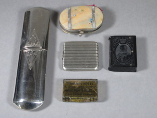 A silver plated spectacle case, a Bakelite vesta case, 2 metal  advertising vesta cases for Terminus Hotel and Ivelcon together  with a purse