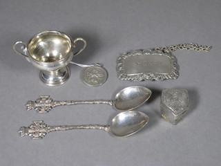A silver sherry decanter label, small silver St Christopher medal, Eastern white metal box, 2 Eastern white metal teaspoons  decorated Jerusalem crosses