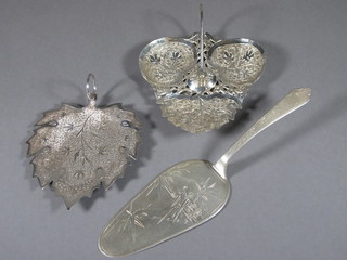 2 embossed white metal leaf shaped dishes and a cake slice  marked Sterling