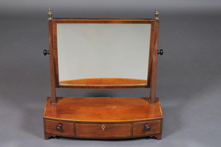 A 19th Century rectangular plate dressing table mirror contained  in a mahogany swing frame, raised on a bow front base fitted 1  long and 2 short drawers, raised on bracket feet 21 1/2"