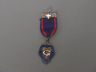 A silver gilt and enamelled Ancient Order of Foresters jewel
